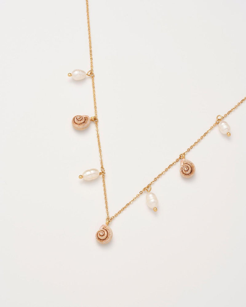 Sea Snail Charm & Pearl Worn Gold Necklace